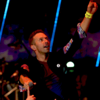 Енді Байрон на концерті Coldplay